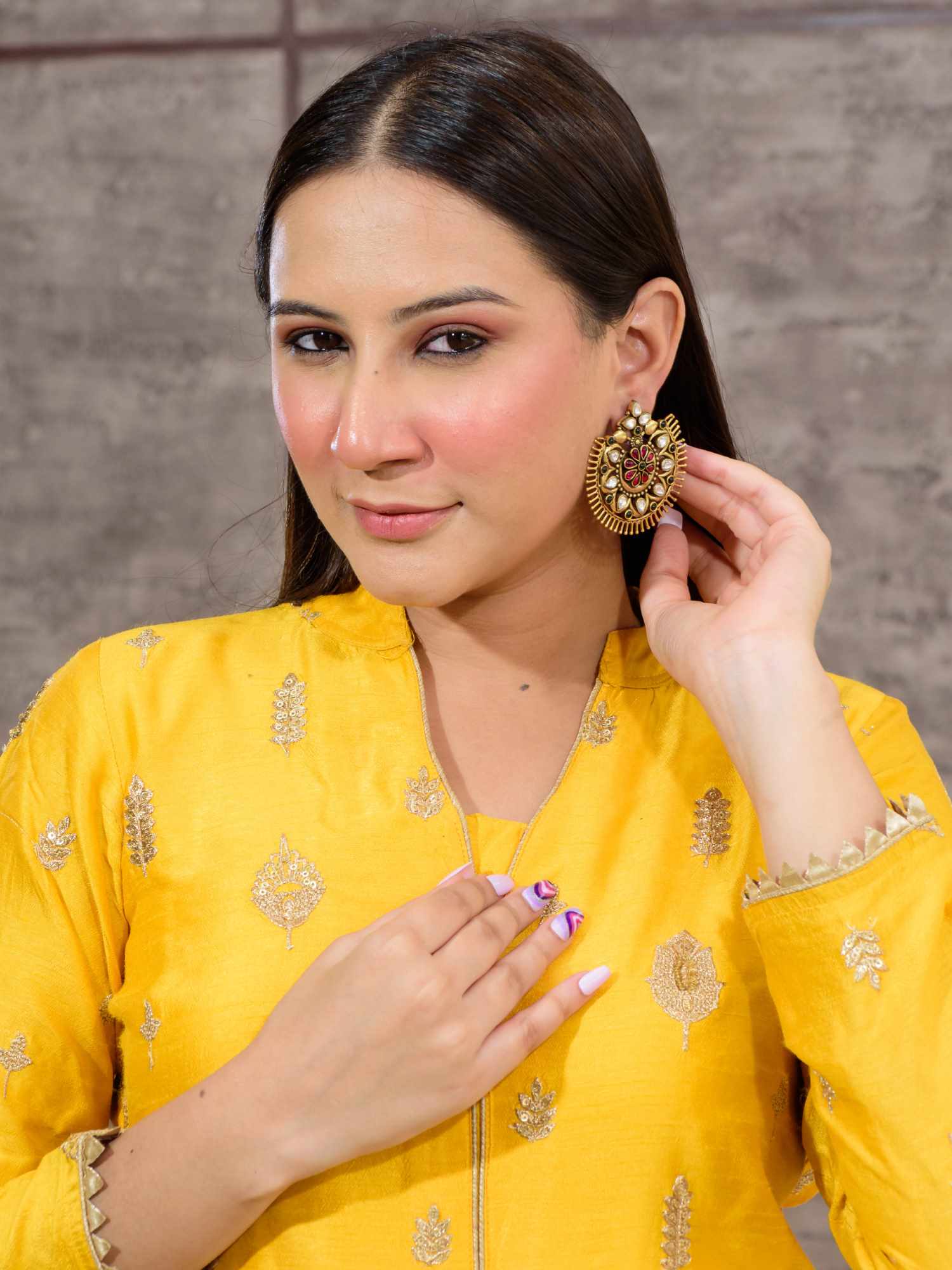 Indian fusion stud earrings with intricate design details