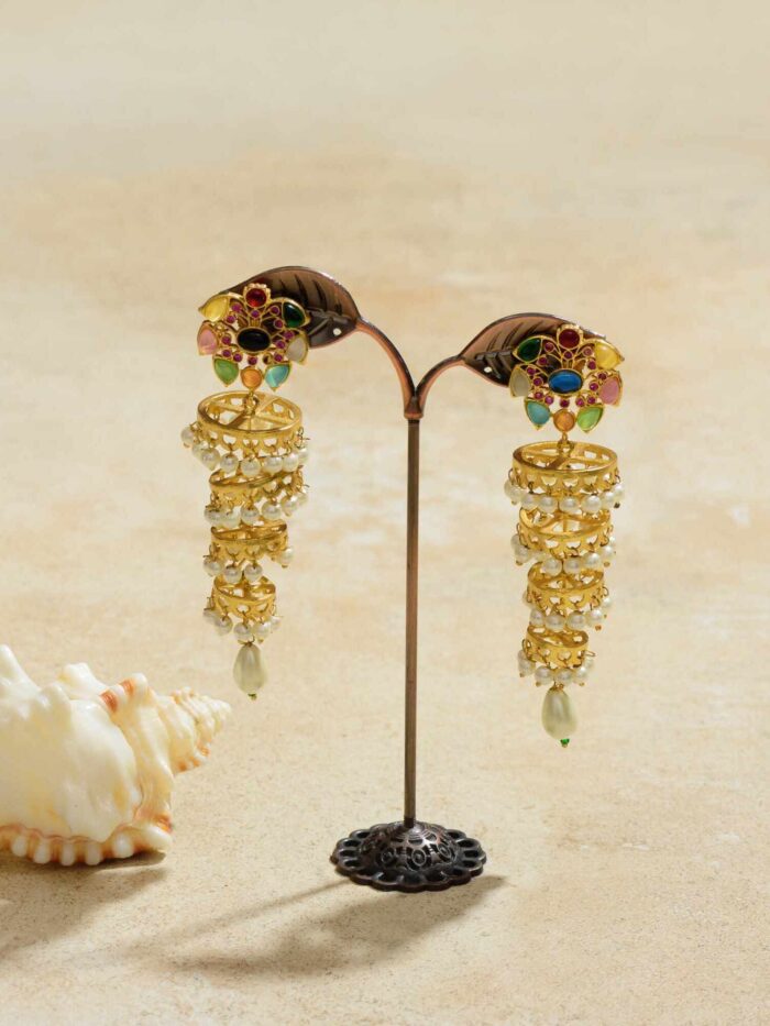 Spiraled earrings adorned with a mesmerizing array of vibrant colors, intertwining in a dance of hues, offering a captivating blend of style and whimsy