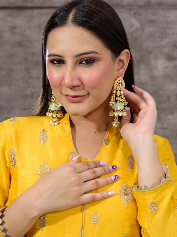 Golden Dewdrops with Green Charm Earrings, a harmonious blend of delicate elegance and the vibrant freshness of nature.