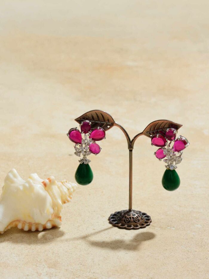 Pink Meadows Green Drops: Earrings that encapsulate the essence of blooming meadows with pink and green hues, adding a touch of nature's beauty to your style.