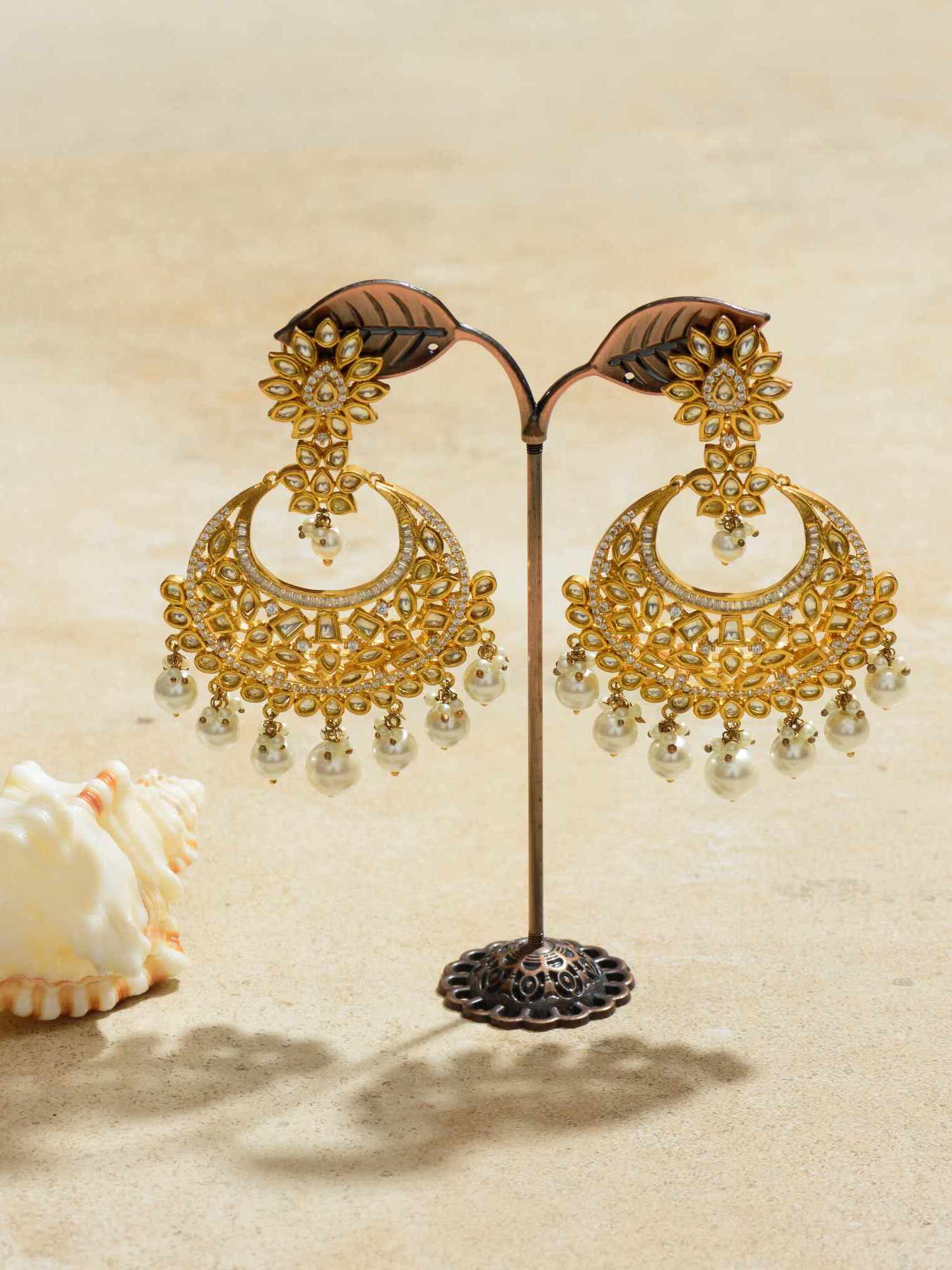 Pearlescent Golden Earrings – a harmonious blend of sophistication and natural beauty.