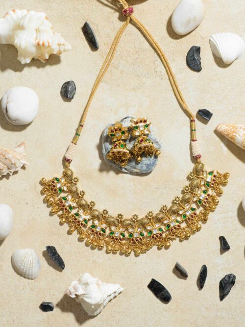 Sun-Kissed Floral Gold Necklace: A Radiant Necklace with a Floral Motif and a Golden Glow.