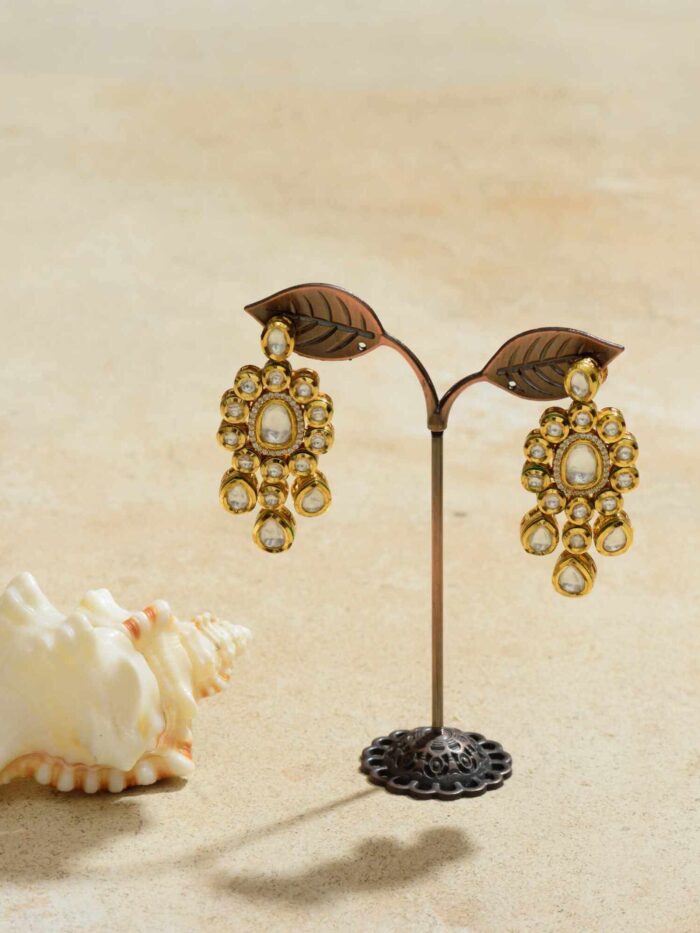 Elegantly designed Sahida Evergreen Kundan Earrings that blend intricate traditional patterns with a modern touch.