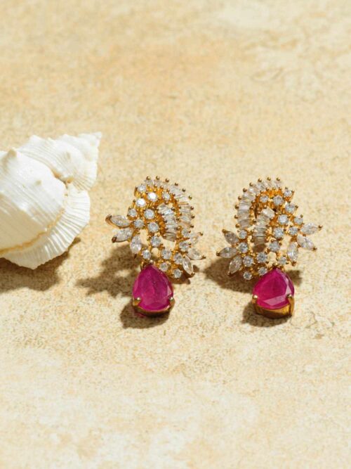 Delicate earrings that radiate with a soft and enchanting pink hue.