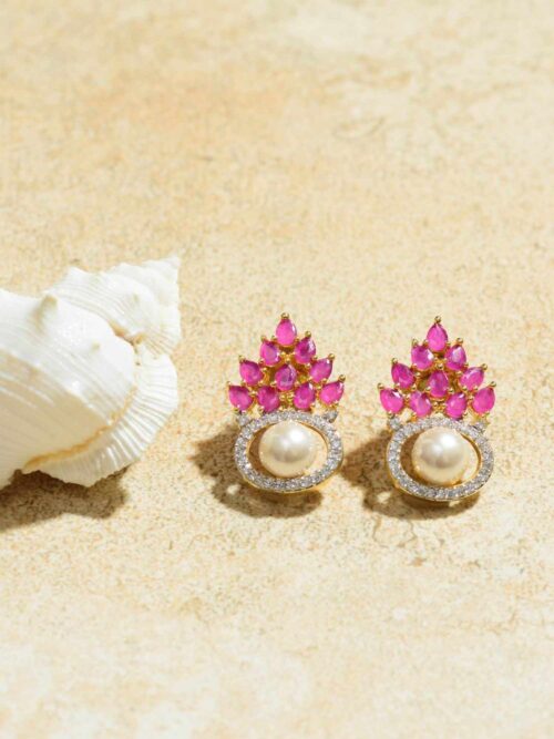 Pink Blush Pearl Earrings: A lustrous gem that embodies elegance with its soft pink hue.