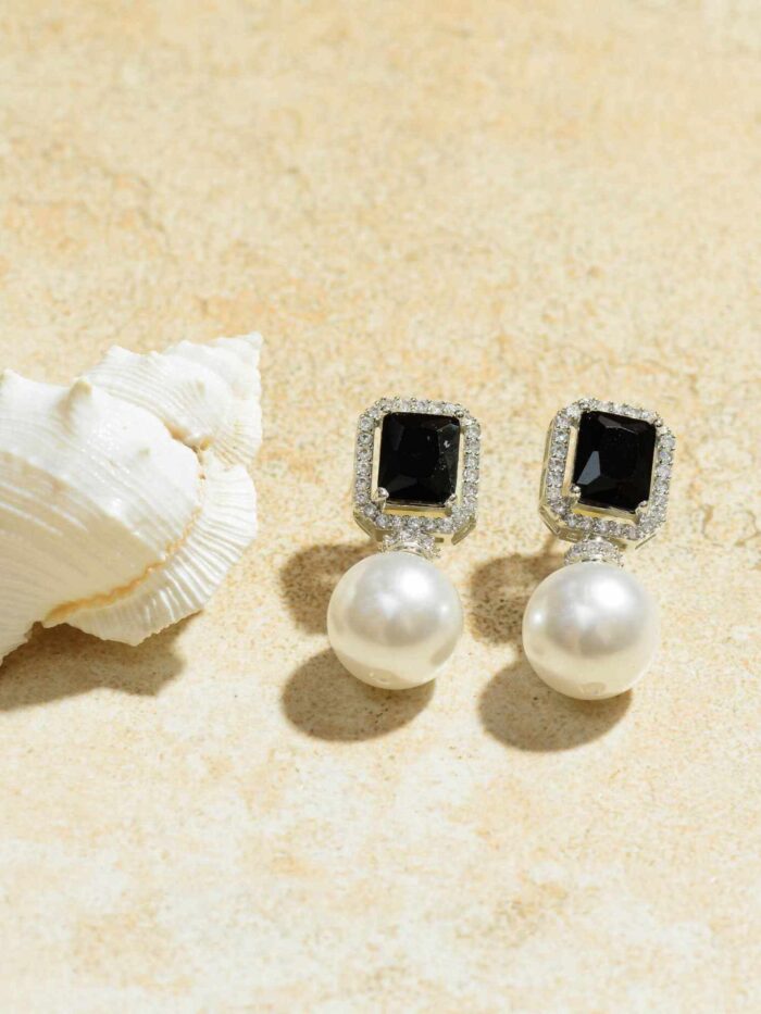 Experience Luminous Duet with black stone and white pearls – Captivating Elegance in Every Glint.